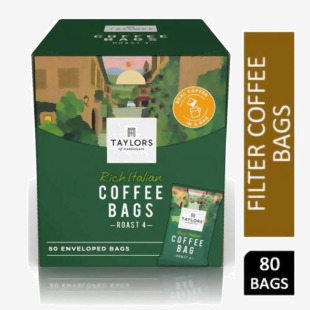 This photograph showcases a pack of 80 rich Italian coffee bags from Bettys & Taylors Coffee. The packaging is attractive with bold, vibrant colors and the coffee bags are neatly stacked and ready for use. The brands logo is prominently displayed, giving a sense of quality and trust. A perfect addition to any coffee lovers pantry.