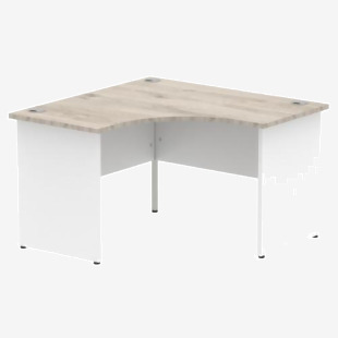 In the photo, we see a sleek and modern Dynamic Corner Desk with an Impulse 1200mm grey oak top and white panel end leg. Its compact corner design maximizes space while providing a clean and functional workspace. The desk is perfect for any office setting, offering versatility and style.