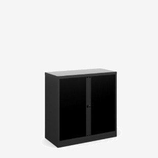 The photo captures a sleek black Bisley tambour cupboard from their systems storage line. The cupboard stands at 1000mm high and showcases a smooth tambour door. Its modern design is ideal for any office space.