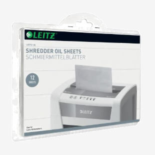 A photo of Leitz Shredder Oil and Leitz IQ Oil Sheets shows small bottles and white sheets of finely coated paper. The products are placed on a white background, showcasing their clean and simple packaging design.