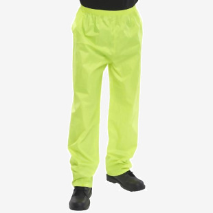 The picture shows a pair of yellow high visibility trousers made by Beeswift. These Nylon B-Dri trousers are in size 2XL and feature the Beeswift logo. The bright color and reflective bands ensure visibility in low light conditions.