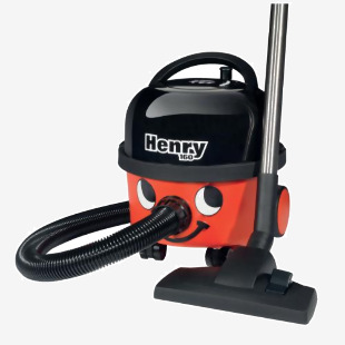 The image shows a vibrant red Numatic Henry vacuum cleaner, standing upright on its four wheels. It has a sturdy, round body and a long hose attached to its side. The powerful 620W motor and large 902395 dust capacity can be seen on the front of the machine. The vacuum is ready to tackle any cleaning task with its NU71552 attachment and efficient design.