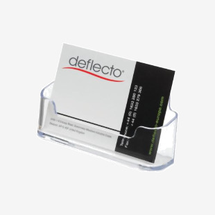 The photograph shows a sleek and modern Deflecto Business Card Holder, designed to hold multiple cards at once. The clear acrylic material allows for easy visibility of the cards inside. Perfect for any office or business setting.