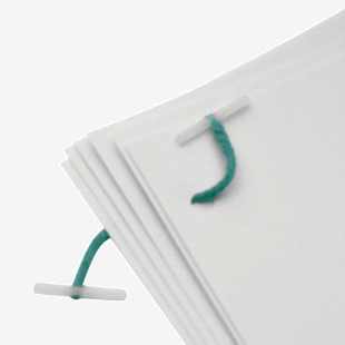 An image of Q-Connect Treasury Tags shows a pack of 100 plastic treasury tags, each measuring 152mm. These tags are durable and suitable for organizing and securing documents in a professional setting.