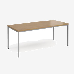 In this photo, you can see the Flexi 25 rectangular table with silver frame measuring 1800mm x 800mm. The oak finish gives this table a warm and natural look, while the silver frame adds a touch of modern elegance. Perfect for any office or conference room setting.