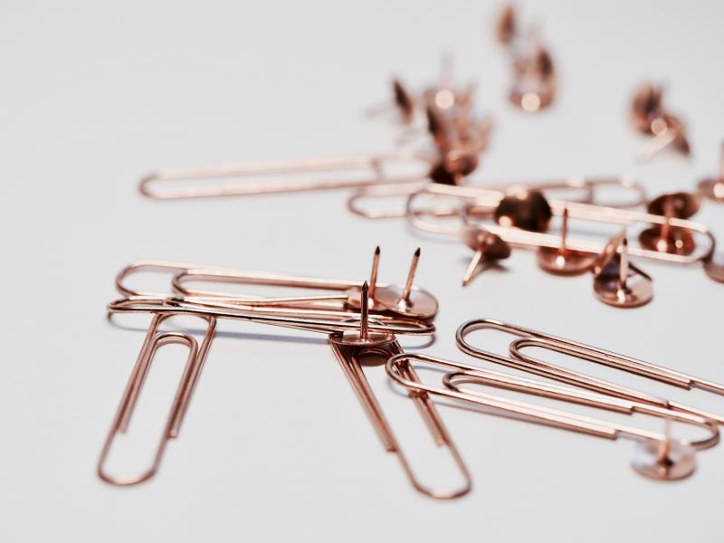 pile of safety pins and push pins