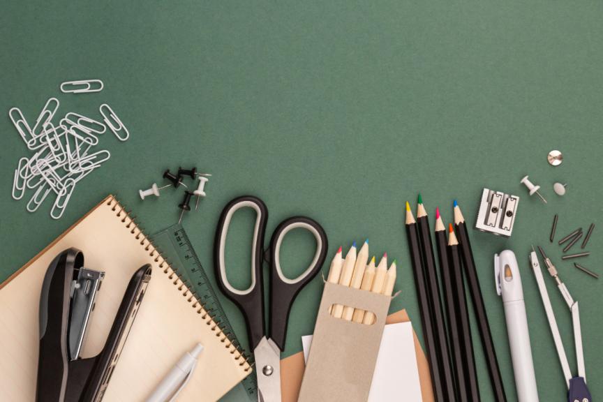 Stationery on green background 