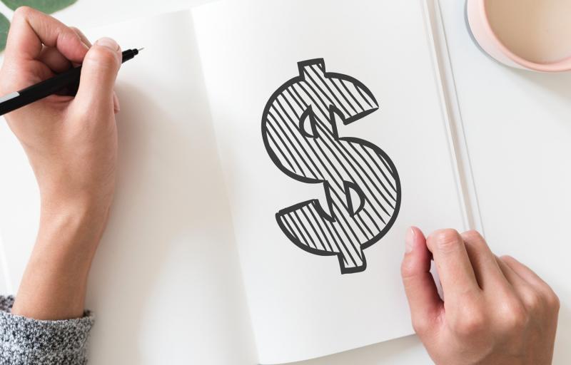 drawing dollar sign note pad